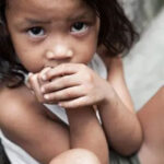 young girl looking sad